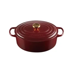 Cocotte En Fonte*LE CREUSET Cocotte en Fonte Ovale 31 cm Garnet Bouton Doré Signature