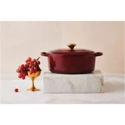 Cocotte En Fonte*LE CREUSET Cocotte en Fonte Ovale 29 cm Garnet Bouton Doré Signature